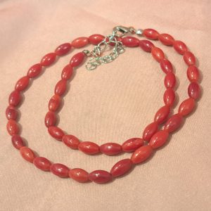 Rizsszem Korall gyöngysor, a bőség köve